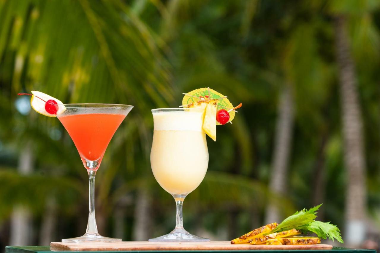 Oceanica Resort Panglao, Bohol Kültér fotó Two tropical drinks
